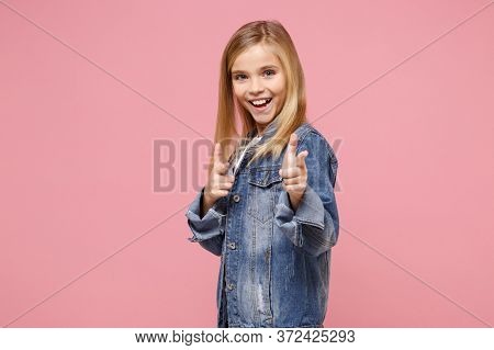 Funny Little Blonde Kid Girl 12-13 Years Old In Denim Jacket Isolated On Pastel Pink Background Chil