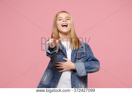 Laughing Little Blonde Kid Girl 12-13 Years Old In Denim Jacket Isolated On Pastel Pink Background C