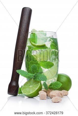 Glass Of Mojito Summer Cocktail With Ice Cubes Mint And Lime On White Background With Cane Sugar And