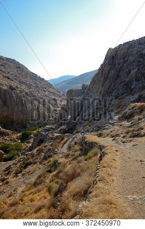 Wadi Kelt Or Nahal Prat, In The Judean Desert, Israel. A Trail In The Rock Along The Edge Of The Gor