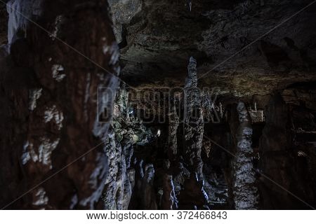 Inside The Mysterious Flowstone Cave 'nebelhöhle' With Stalagmites And Stalactites In Germany.