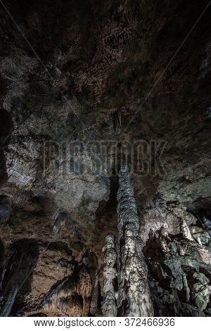 Inside The Mysterious Flowstone Cave 'nebelhöhle' With Stalagmites And Stalactites In Germany.