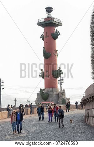 Russia, St. Petersburg, 12,04,2015 Rostral Column On The Spit Of Vasilyevsky Island In St. Petersbur