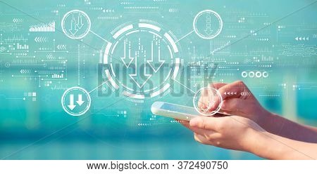 Descending Arrows With Person Holding A White Smartphone