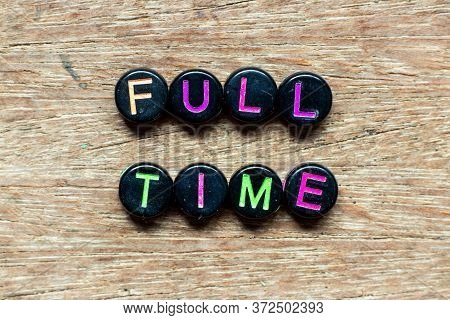 Black Bead With Color Letter In Word Full Time On Wood Background