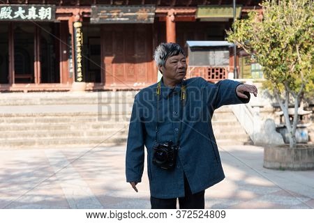 Yunnan, China February 2019. Inhabitants Of A Rural Village Amazed By The Presence Of Western Touris
