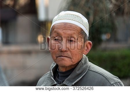 Yunnan, China February 2019. Inhabitants Of A Rural Village Amazed By The Presence Of Western Touris