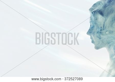 Esoteric Portrait. Spiritual Enlightenment. Blue Mist In Peaceful Woman Silhouette Double Exposition