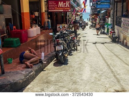 Koh Phangan, Thailand- April 20 2019: Haad Rin Beach Street After Full Moon Party, Sleeping Tourist