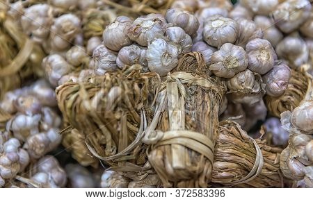 Garlic. Vegetables. Fragment From A Fruit And Vegetable Shop.