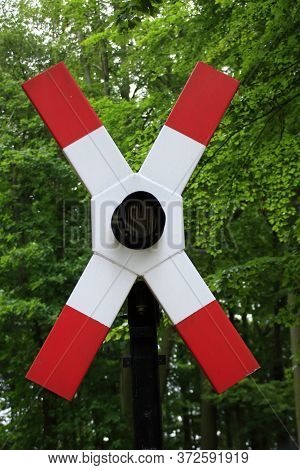 St. Andrew's Cross With Warning Lamp At A Level Crossing