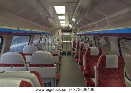 Electric Multiple Unit Interior With Red Seat In First Class Coach