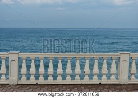 View From The Embankment To The Sea. Railing. The Base For The Postcard, The Place For The Text.