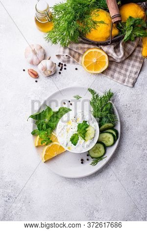 Traditional Greek Sauce Or Appetizer Tzatziki With Yogurt, Garlic, Cucumber And Dil