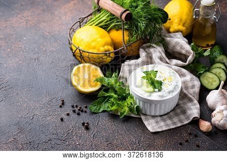 Traditional Greek Sauce Or Appetizer Tzatziki With Yogurt, Garlic, Cucumber And Dil