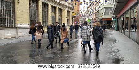 Sarajevo, Bosnia And Herzegovina, March 8, 2020. People On The Streets Of Sarajevo. Tourists And Loc