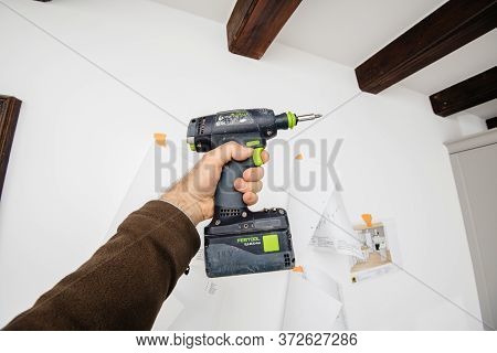 Paris, France - Jun 8, 2020: Male Worker Holding In Hand Cordless Drill T 18 Plus 3 C 3, 1-plus Manu