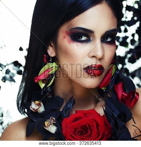 Pretty Brunette Woman With Rose Jewelry, Black And Red, Bright Make Up Kike A Vampire Closeup Red Li