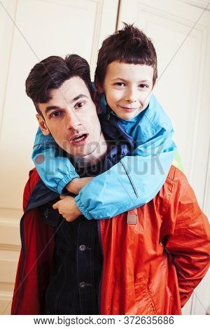Faher And Son Together Having Fun At Home, Lifestyle Happy Family, People At Home