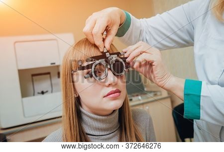 Trial Frame. Glasses For A Young Woman. Ametropia Correction With Glasses.