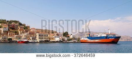 Symi, Greece - June 21, 2020: Symi Town, Symi Island, Pictorial View Of Colorful Houses And  Yialos 