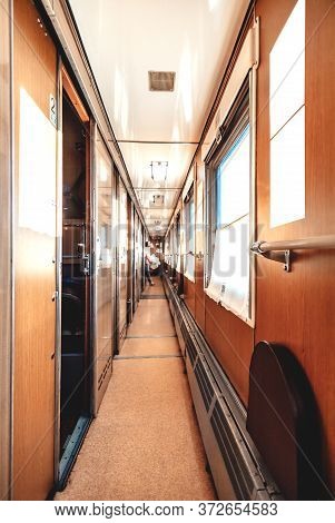 Interior Of A Long-distance Train In Russia. Long Corridor