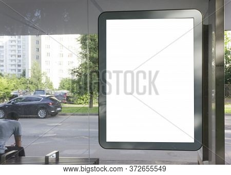 Advertising At A Bus Stop During The Day Mockup.
