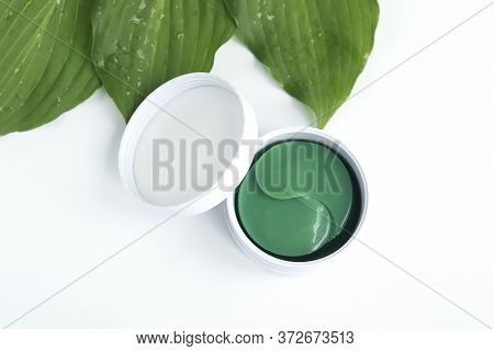 . Cosmetic Hydrogel Patches For Moisturizing And Nourishing The Skin Around The Eyes On A Light Back