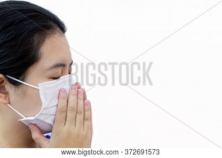 Coronavirus, Woman Wearing A Mask To Protect Her Face From The Corona Virus And Prevent The Spread O
