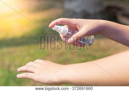 Women's Hands Are Injecting 70% Alcohol Killing Bacteria And The Coronal Virus Or Covid-19 To Preven