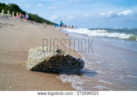 Stone On The Beach Of The Baltic Sea Near Rewal In Poland