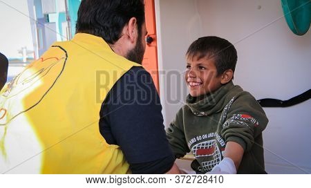 Aleppo, Syria 10 April 2020
A Child Fighter Supplies Ammunition To His Comrades
A Doctor Plays With 