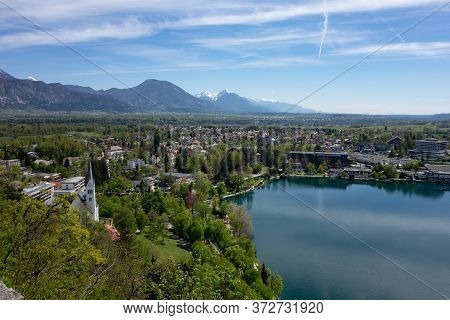 The Hotels, Commercial Buildings Without Logos And Saint Martin Church In Bled, Slovenia With A Blej