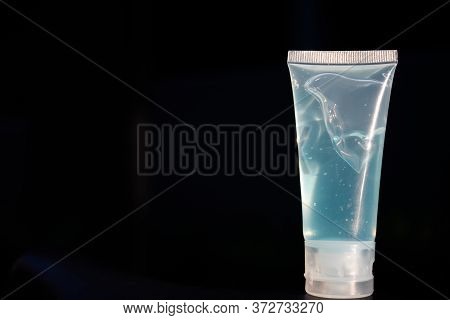 The Alcohol Gel Bottle Is On The Right Side. On The Window Sill And The Background Is The Sky. Alcoh