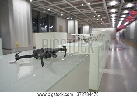 SHENZHEN, CHINA - CIRCA APRIL, 2019: DJI drone model on display as seen at China International Consumer Electronics Exchange/Exhibition Center (CEEC) at UpperHill in Shenzhen.
