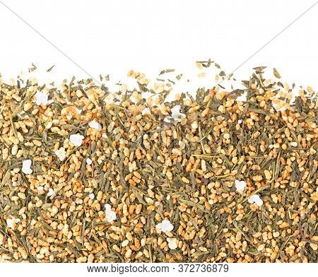 Japanese Green Tea Genmaicha, Isolated On White Background. Tea Leaves With Roasted Brown Rice. Orga