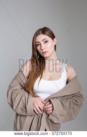 Attractive Caucasian Girl With Long Hair Looking At Camera. Beauty Portrait, Model Tests Of Pretty F