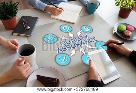 Quality Assurance Control Guarantee Customer Service Satisfaction Concept On Office Desktop.