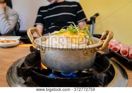 Korean food of army stew or army base stew (Budae Jjigae) in the restaurant