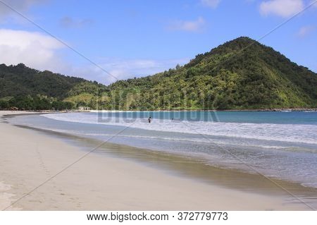 Sunny Day On White Sand Mawun Beach Lombok. Kuta Lombok Is An Exotic Paradise On The Indonesian Isla