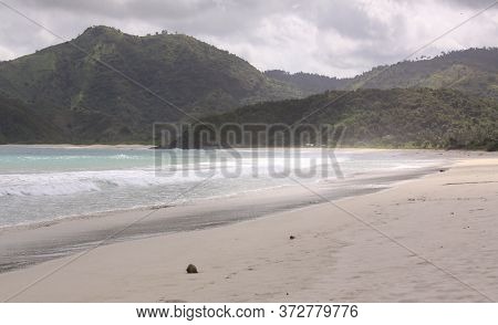 Coconut On Mawun Beach Lombok, Indonesia. Kuta Lombok Is An Exotic Paradise On The Indonesian Island