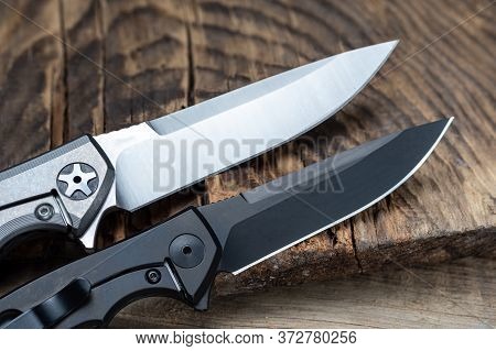 Two Knives With Different Blades. Black And White Blade Of A Knife. The Choice Of A Knife.