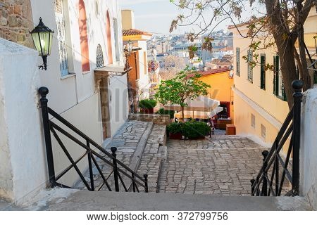 Small Cosy Street With Steep Stairs Of Famous Placa District In Athens, Greece
