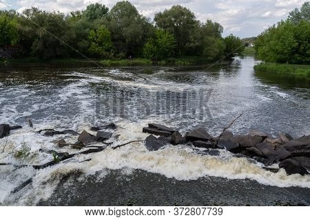 The River Beats Against Stones. Dam. Teterev River In Korostyshev. Zhytomyr Region, Ukraine.