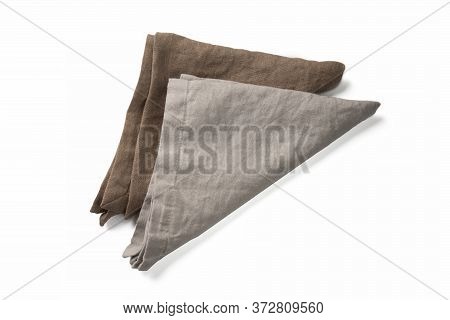 Two Brown Triangle Linen Napkins For Table Setup