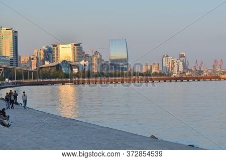 Baky Skyline View From Baku Boulevard The Caspian Sea Embankment . Tall Buildings In Baku. Ship Cran