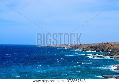 Arikok Natural Park On The Island Of Aruba In The Caribbean Sea With Deserts And Ocean Waves On The