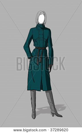 Ragazza nel lungo cappotto e stivali