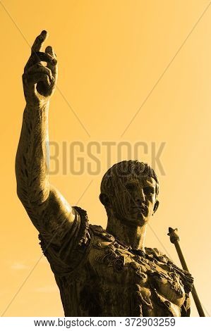 Statue Of The Emperor Trajan In Fori Imperiali Street, Rome, Italy