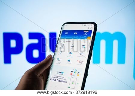 Paytm App Logged In On A Mobile Infront Of A White Screen With Paytm Written